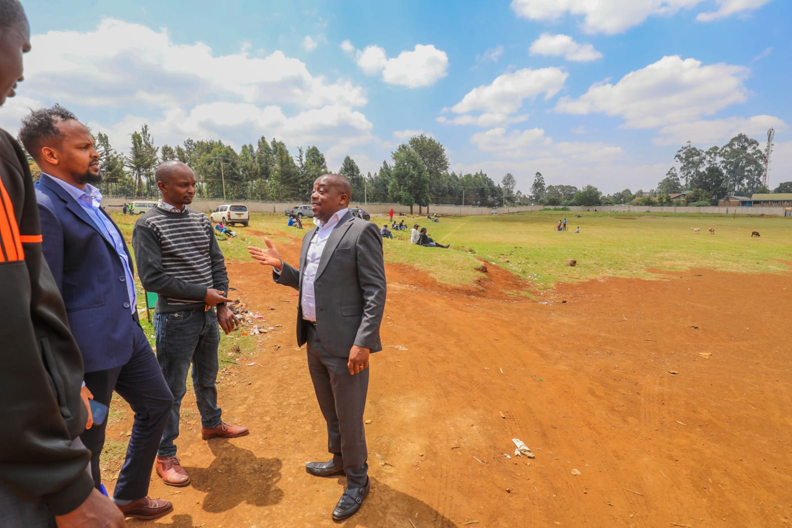 Hon. Joseph Muhinja Kamau explaining stadium plans to officials