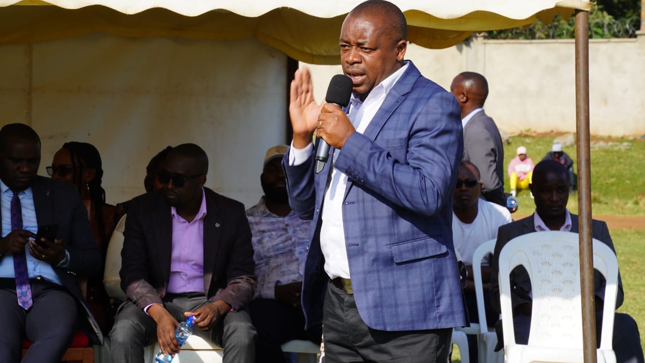 Hon. Joseph Muhinja Kamau speaking at a traders' empowerment event